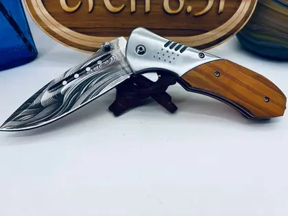 Custom engraved knife or tool example