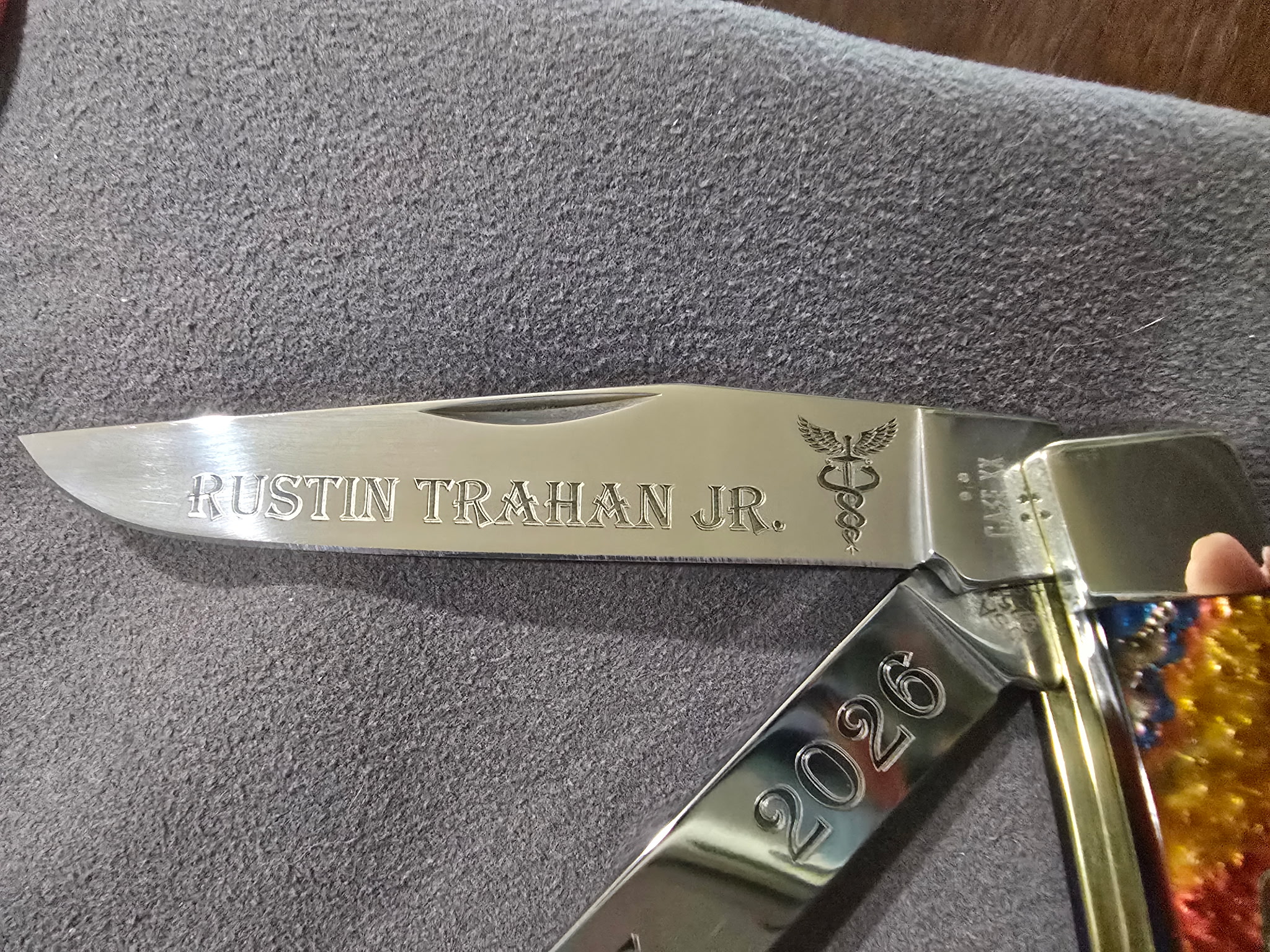 Name engraved on polished knife blade